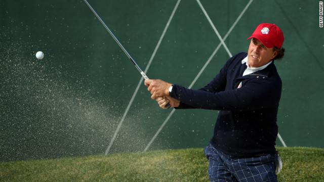 Phil Mickelson plays a bunker shot on 10th tenth hole on Friday.