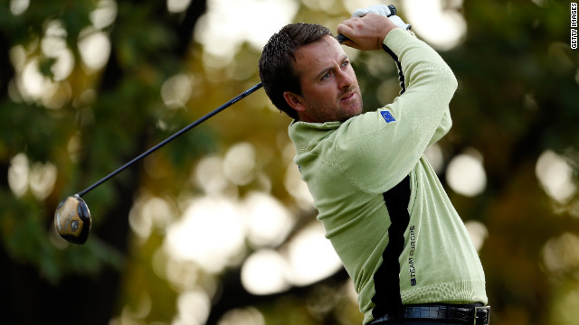 Graeme McDowell of Europe watches a shot during the Morning Foursome matches of the Ryder Cup on Friday.