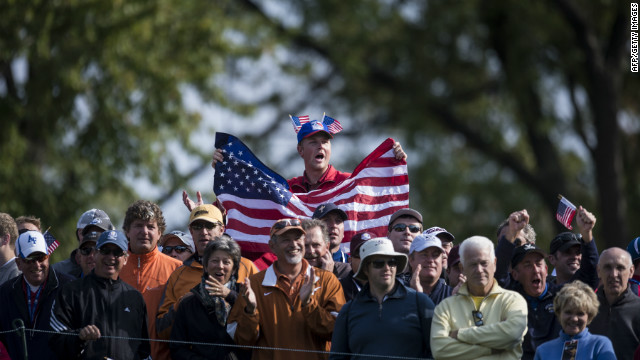 Fans watch during the morning foursome matches Friday at the Medinah Country Club.