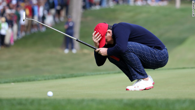 Keegan Bradley of the United States reacts after putting on the 14th green Friday.