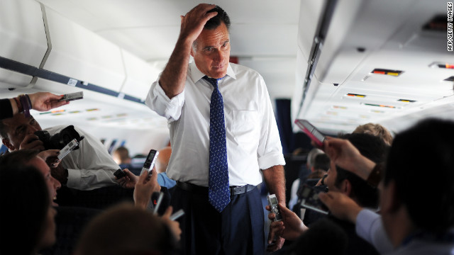 Republican presidential candidate Mitt Romney talks to journalists aboard his campaign plane about his phone call with Israeli Prime Minister Benjamin Netanyahu on Friday, September 28, with 39 days to go before the election.