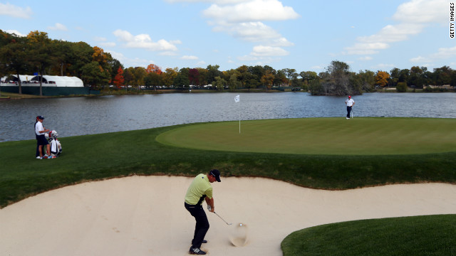 Peter Hanson of Europe plays a bunker shot on the second hole during the afternoon four-ball matches on Friday.