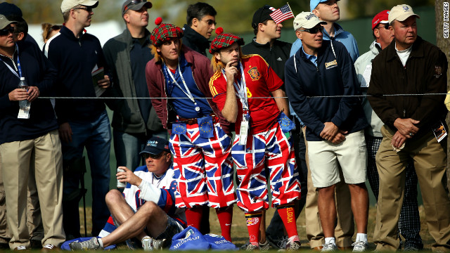 European fans watch the actiion in flamboyant outfits on Friday.