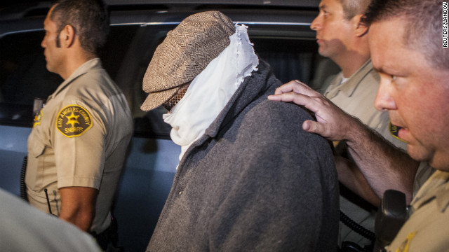 Nakoula Basseley Nakoula is led out of his home by Los Angeles County Sheriff's officers in Cerritos, California, September 15. 