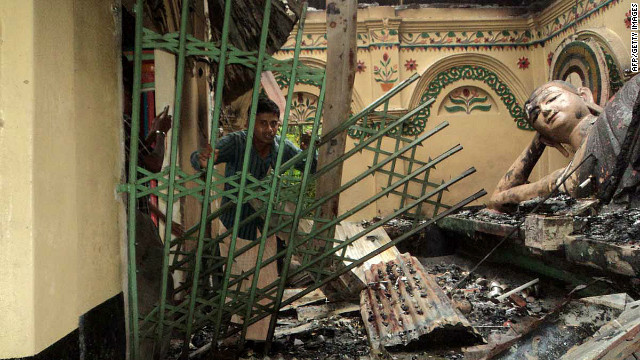 Rioters torched Buddhist temples and homes in Bangladesh over a Facebook photo deemed offensive to Islam.