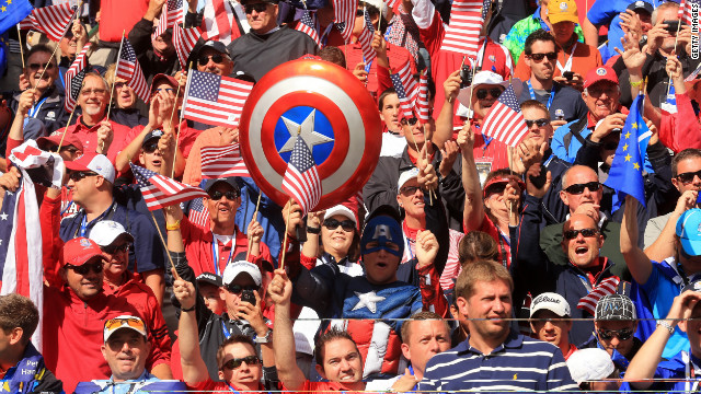 Team USA fans cheer from the stands Sunday.