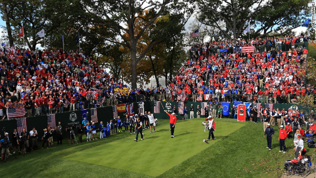 Bubba Watson of the United States watches his tee shot on the first hole Sunday.