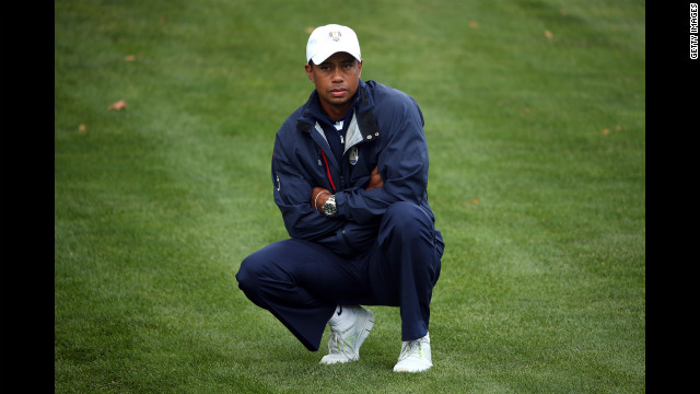 Tiger Woods of the United States watches from the fairway on the first hole Sunday.