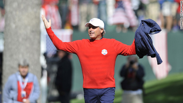 Team USA Assistant Captain Fred Couples stirs up the crowd during play Sunday.