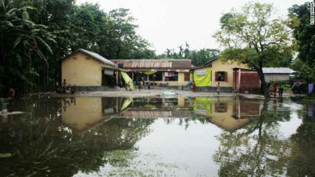 Most of the estimated 300,000 people displaced by the July riots are living in makeshift relief camps in schools. As a result, the start of the academic year has been cancelled for tens of thousands of students. Here at an emergency relief camp in a school in Kokrajhar district, residents have to wade through a 40-feet wide puddle to access their home. 