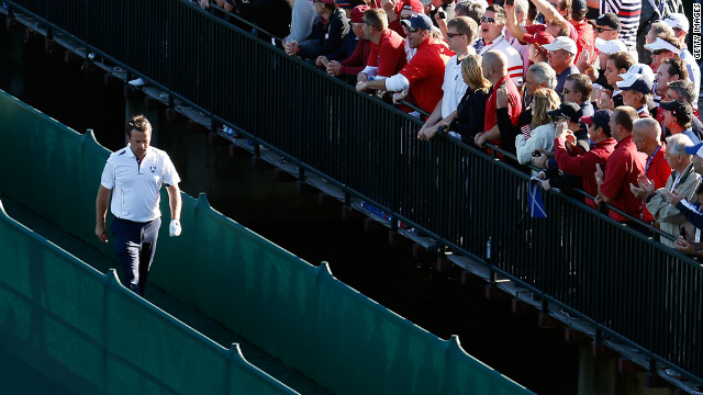 Graeme McDowell of Europe crosses a bridge during the singles matches on Sunday.