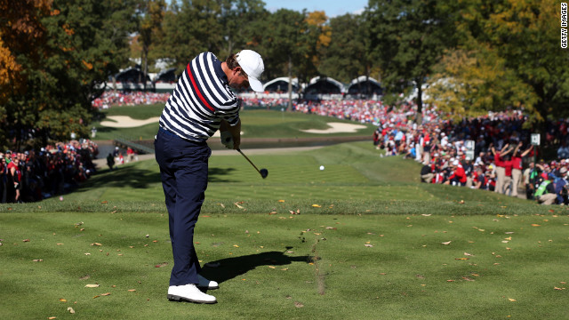 Webb Simpson of the United States hits his tee shot on the 13th hole Sunday.