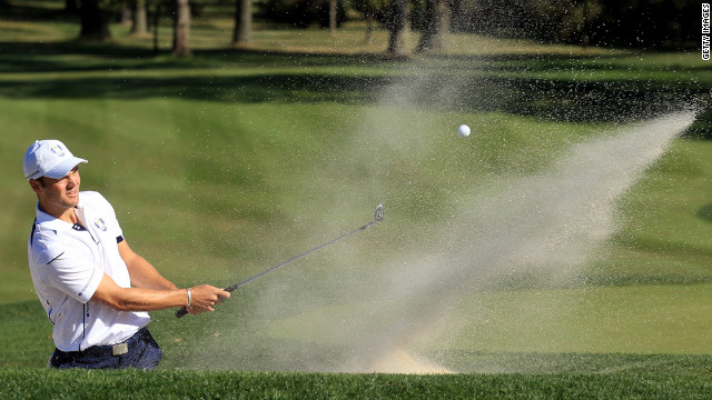 Martin Kaymer of Europe plays a bunker shot on the ninth hole Sunday.