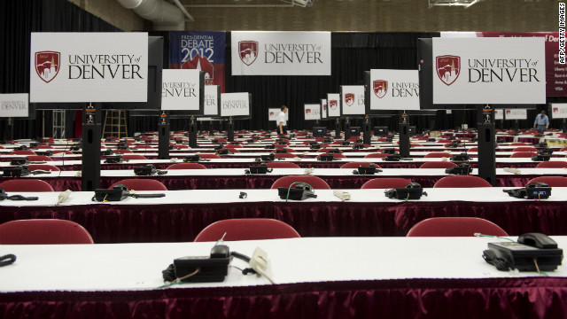 Desks sit ready for reporters in the media center on Monday.