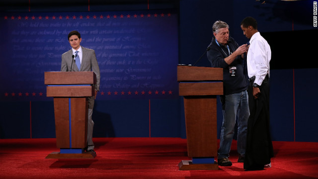 Gonzales, left, and Mohamed stand in for Romney and Obama on Tuesday. 