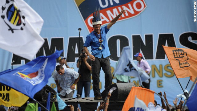 Capriles wears a native decoration from a shaman during a campaign rally in Puerto Ayacucho on Monday, October 1. Chavez's opponents are confident that on Sunday, Capriles will unseat the long-ruling leftist leader, a refrain previously heard before eventual defeats.