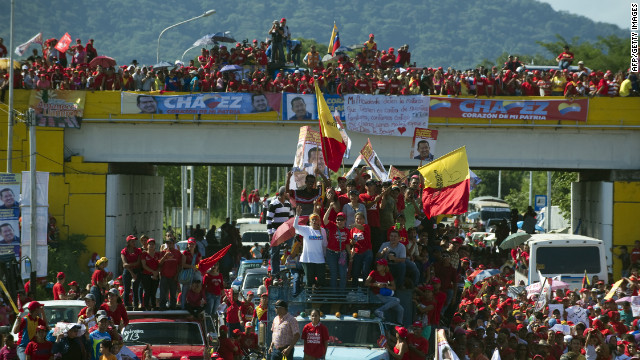 Chavez supporters attend a campaign rally in Boconoito on Monday.