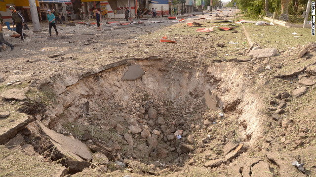 Car bomb explosions on Wednesday left a crater in the ground.