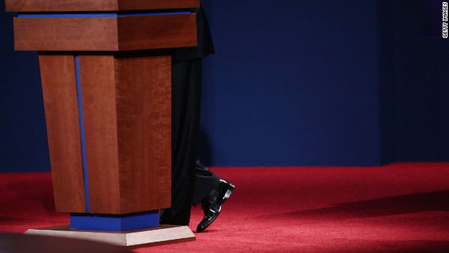 Obama stands at the podium as he speaks during the debate on Wednesday.