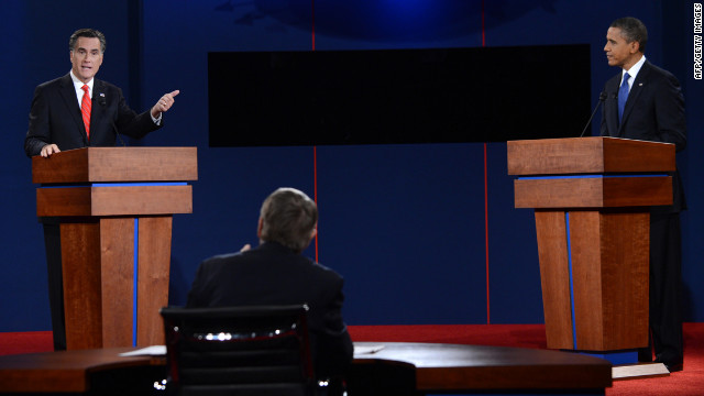 Romney answers a question from the moderator.