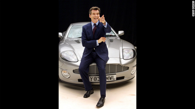 Pierce Brosnan poses on an Aston Martin before starting filming on "Die Another Day" in January 2002. 
