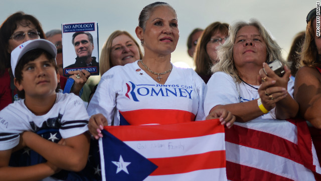 Romney supporters listen during Friday's campaign event in St. Petersburg.