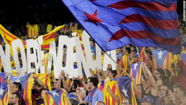 Barcelona fans hold letters forming the word 'Independencia' and wave Catalan 'Estelada' independence flags in the match against Real Madrid. 