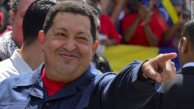 Chavez greets a crowd before voting Sunday. The 58-year-old leader has been weakened by two surgeries for cancer, keeping secret the type of cancer and his prognosis. Photos: Venezuela's presidential vote