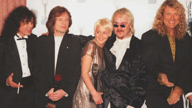 Page, Jones and Plant are joined by the late Bonham's children, Zoe and Jason, after the group's induction into the Rock and Roll Hall of Fame in 1995.