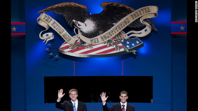 Centre College students Ben Boone, left, a stand-in for U.S. Vice President Joe Biden, and Tommy Munoz, a stand-in for Republican Vice Presidential candidate Paul Ryan, wave during a rehearsal for the vice presidential debate in Danville, Kentucky, on Wednesday.