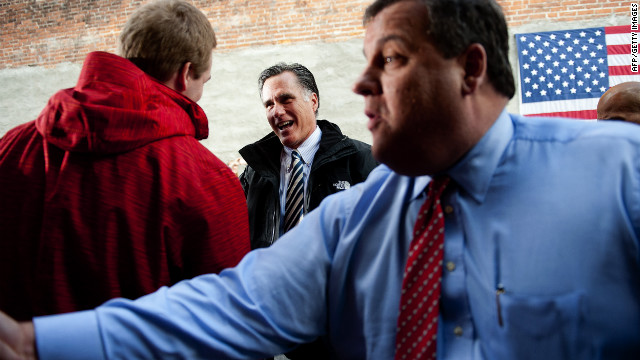 Republican presidential candidate Mitt Romney and New Jersey Gov. Chris Christie talk with supporters at Buns Bakery and Restaurant in Delaware, Ohio, on Wednesday, October 10. Romney is campaigning in Ohio with less than a month to go before the general election.