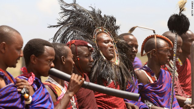 Masai men giving a traditional greeting at Majengo Maasai Boma in Arusha, Tanzania. 