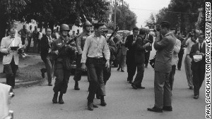 Atlanta hoped to avoid scenes like this one from Little Rock, Arkansas, where federal troops enforced integration after violent acts rocked the city.