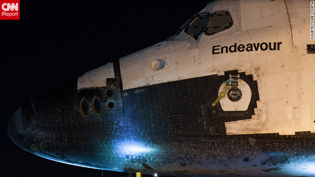 CNN iReporter Wes Smith and other space enthusiasts get a close-up view of the space shuttle Endeavour early Friday, October 12, as it makes its final journey from Los Angeles International Airport to the California Science Center. Smith says he saw the shuttle about 5 a.m. PT after waiting in a Los Angeles parking lot across from Endeavour's overnight holding area. 