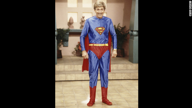 Collins poses in a Superman costume during the taping of "Hour Magazine" in 1987 in West Hollywood, California.