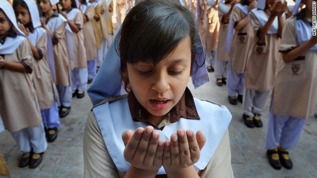 Pakistani school girls pray for the recovery of teen activist Malala Yousufzai at their school in Peshawar on Friday, October 12. Malala, 14, was shot in the head by the Pakistan Taliban in an assassination attempt on Tuesday.