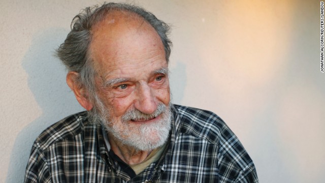 U.S. economist Lloyd Shapley smiles outside his home in Los Angeles after being notified that he won the 2012 Nobel Memorial Prize for Economics on Monday, October 15. He and Alvin Roth share the award for their work in market design and matching theory.