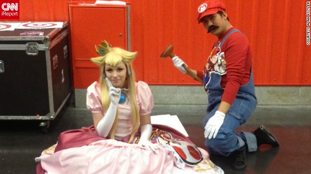 Video game characters are also popular costume choices, as you can see with Super Mario and Princess Toadstool.