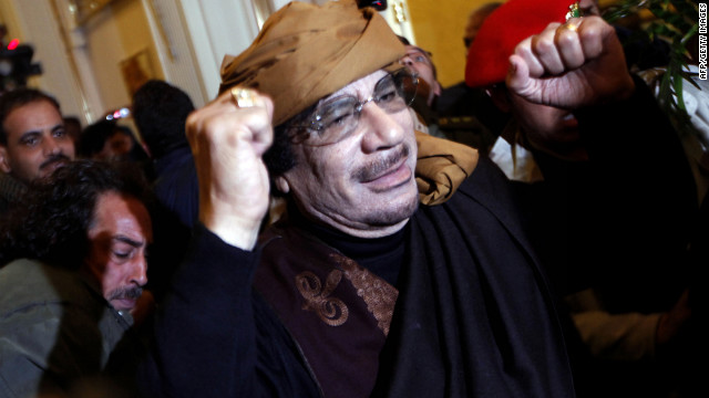Libyan strongman Moammar Gadhafi arrives at the Rixos hotel in Tripoli on March 8, 2011.
