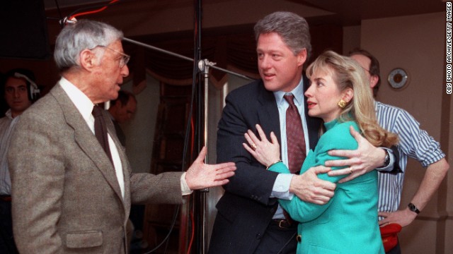 Bill Clinton embraces his wife shortly after a stage light fell and knocked her down on January 26, 1992. They talk to Don Hewitt, producer of the CBS newsmagazine "60 Minutes."