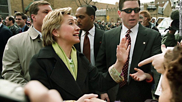 Clinton shakes hands during a St. Patrick's Day parade in the Sunnyside neighborhood of Queens, New York, on March 5, 2000.