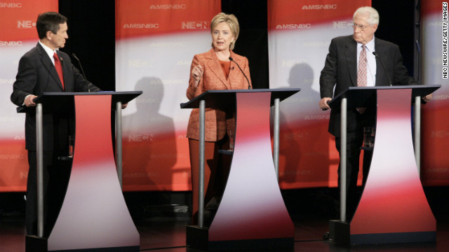 Clinton addresses a question during a Democratic presidential candidates debate at Dartmouth College in Hanover, New Hampshire, on September 26, 2007. Also pictured are U.S. Rep. Dennis Kucinich of Ohio, left, and former U.S. Sen. Mike Gravel of Alaska.