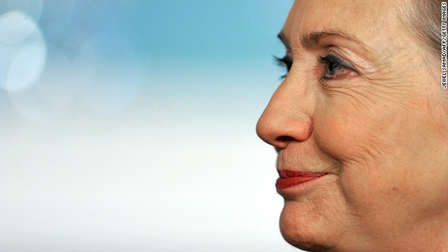 Clinton listens as Turkish Foreign Minister Ahmet Davutoglu (not in picture) makes a brief statement before a bilateral meeting at the State Department in Washington on November 29, 2010.