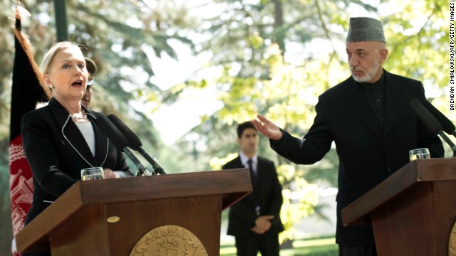 Clinton speaks as Hamid Karzai, president of Afghanistan, listens during a news conference at the presidential palace in Kabul on July 7, 2012.