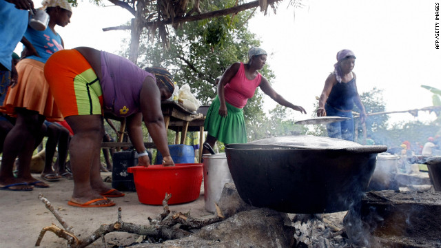 Members of a quilombo community in Vao de Almas, Brazil. Quilombo communities were formed by escaped slaves during the Portuguese colonialism and many are isolated from modern Brazil. The 400 families living in Vao de Almas have no road, water, electricity, telephone or doctor. 