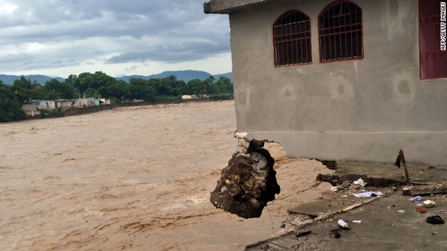 A house ruined by heavy flooding from Hurricane Sandy sits abandoned in Port-au-Prince, Haiti, on Thursday.