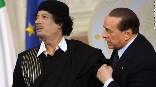 The late Moammar Gadhafi attends a meeting with Berlusconi in Rome on June 10, 2009.