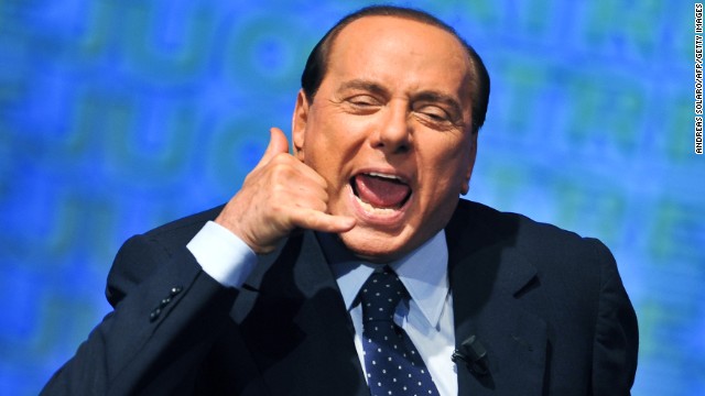 Silvio Berlusconi gestures as he takes part at a People of Freedom meeting in Rome on September 9, 2009. Italy's three-time former prime minister received a four-year sentence for tax fraud -- and although he may only serve one year, his political future has been thrown into doubt.