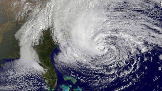A satellite image from 10:10 a.m. ET on Sunday shows Hurricane Sandy in the Atlantic Ocean grazing the East Coast.
