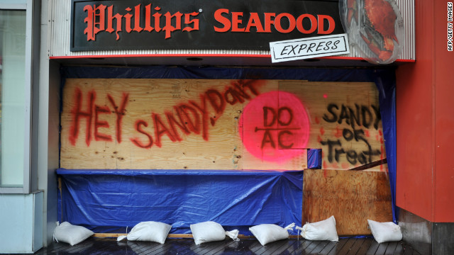 A restaurant on the boardwalk in Atlantic City, New Jersey, is boarded up in preparation for the bad weather on Monday. 